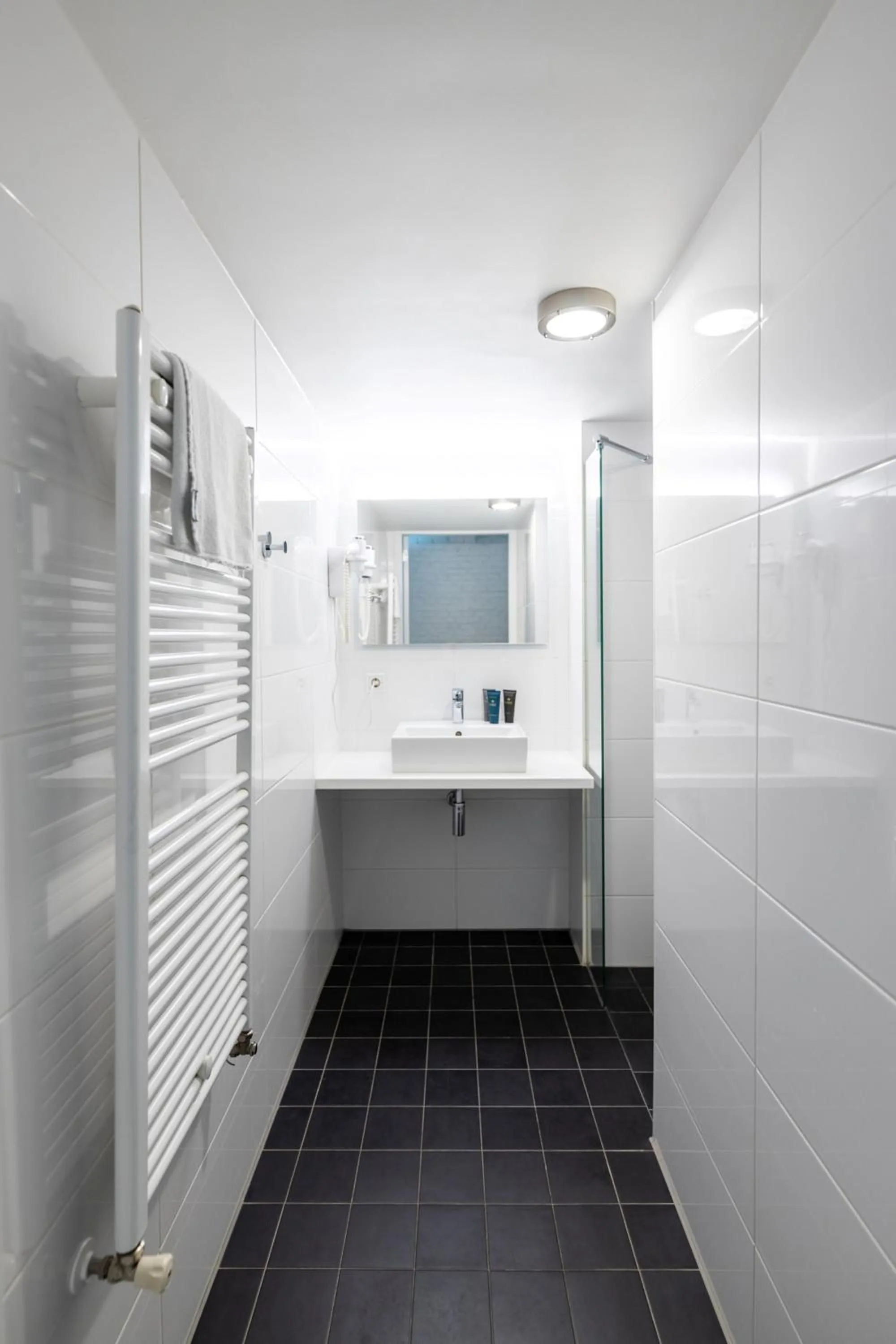 Bathroom in YAYS Amsterdam Salthouse Canal by Numa