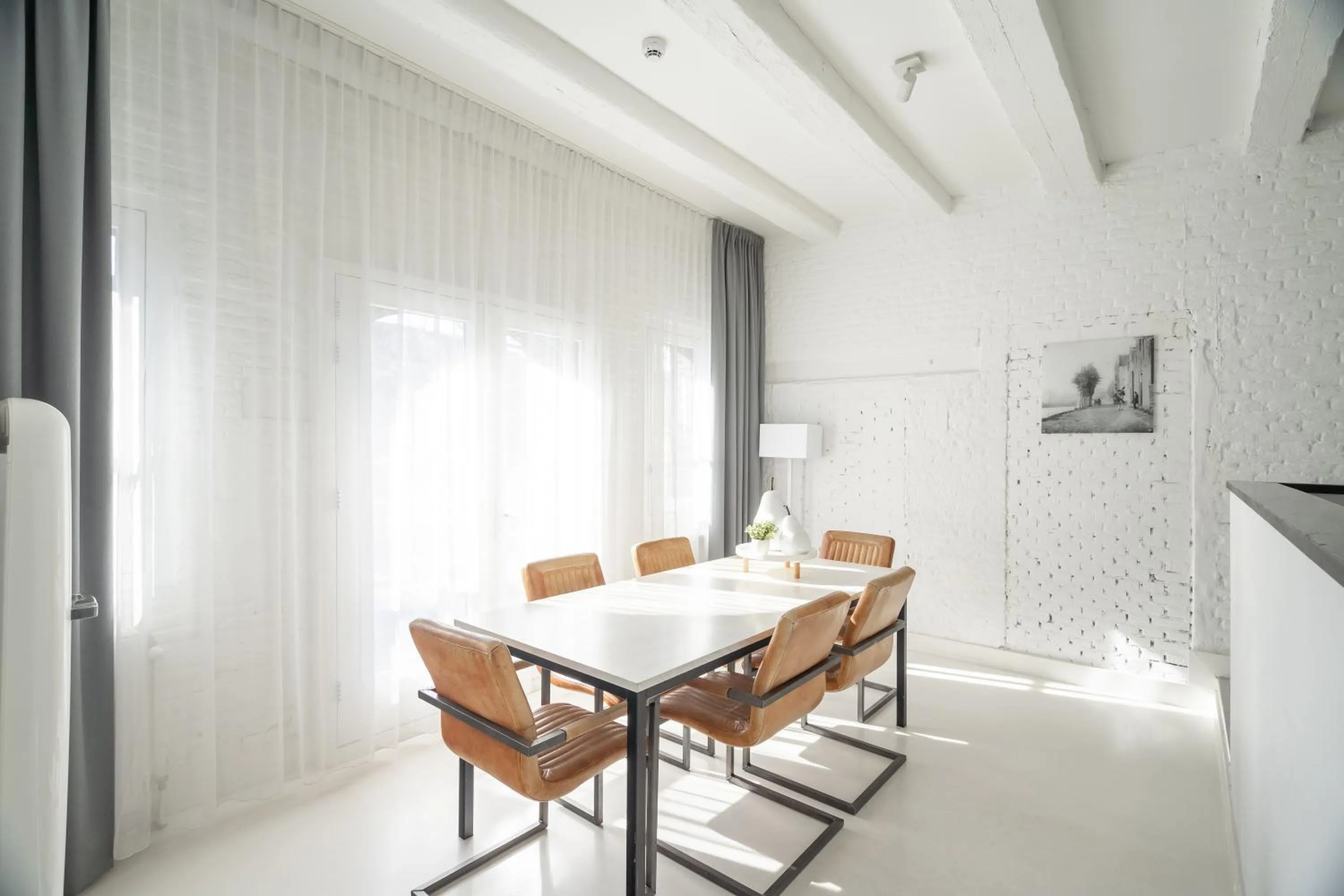 Dining area in YAYS Amsterdam Salthouse Canal by Numa