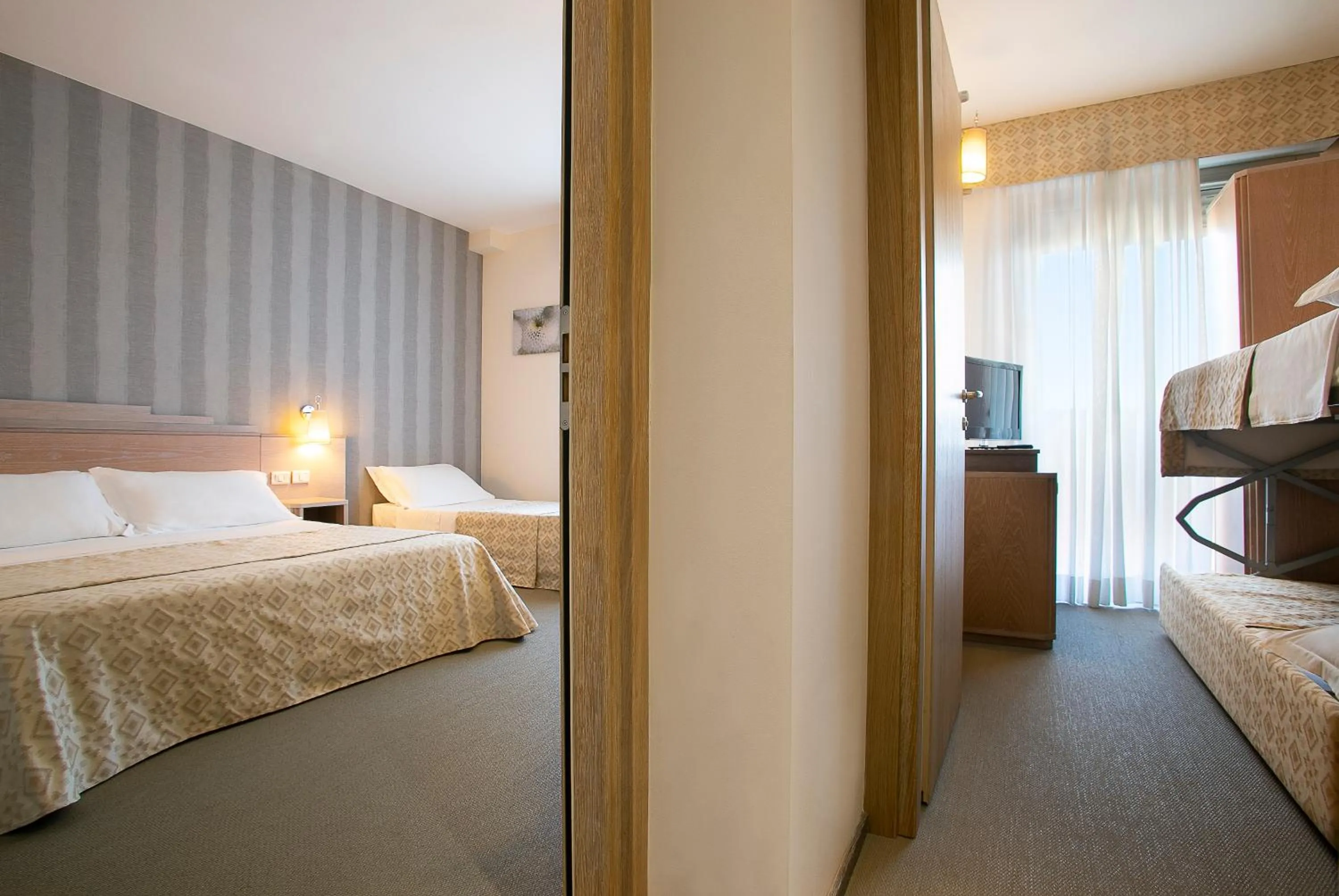 Photo of the whole room, Bed in Hotel Europa Lignano