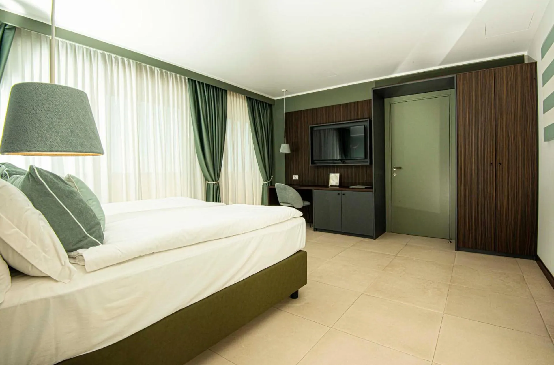 Photo of the whole room, Bed in Hotel Europa Lignano