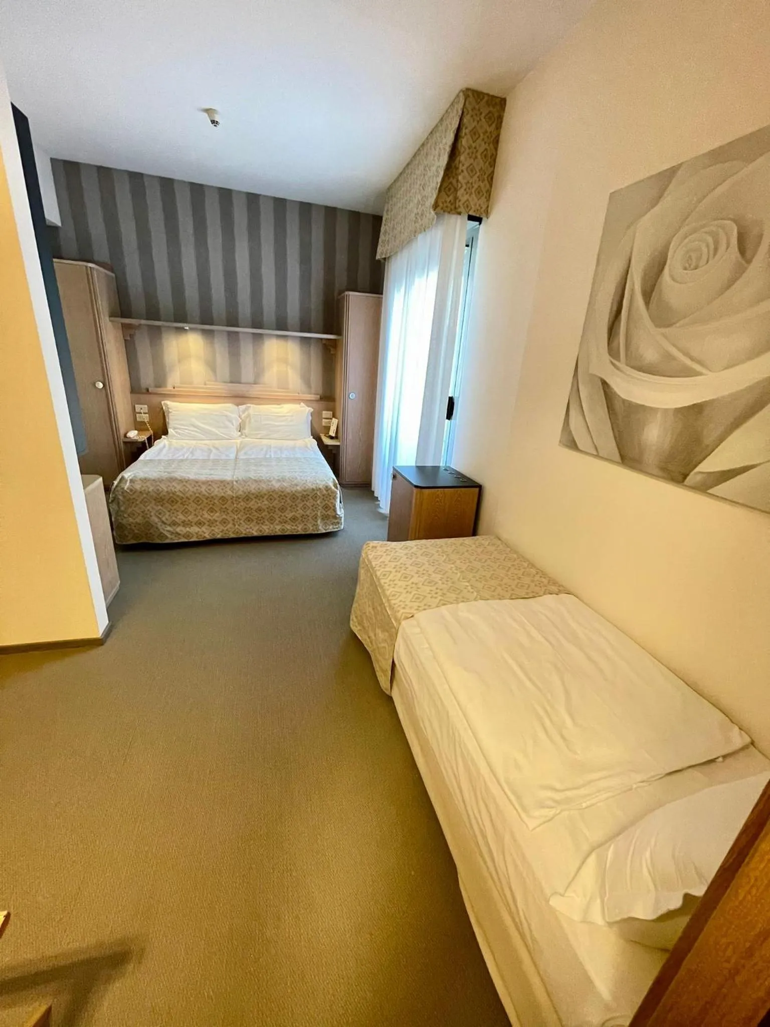 Photo of the whole room, Bed in Hotel Europa Lignano