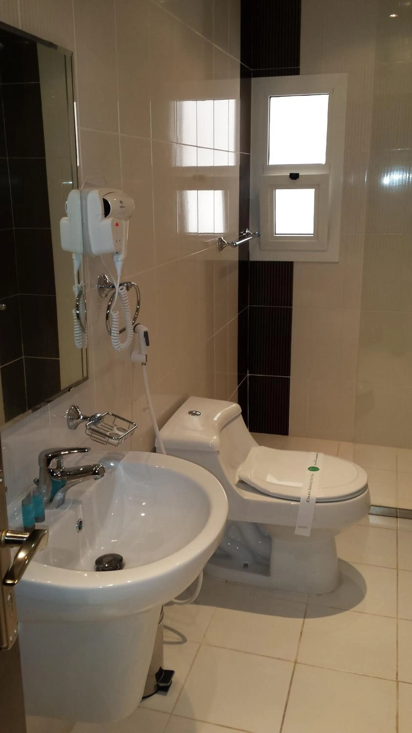 Toilet in Ashbonh Hotel Suites