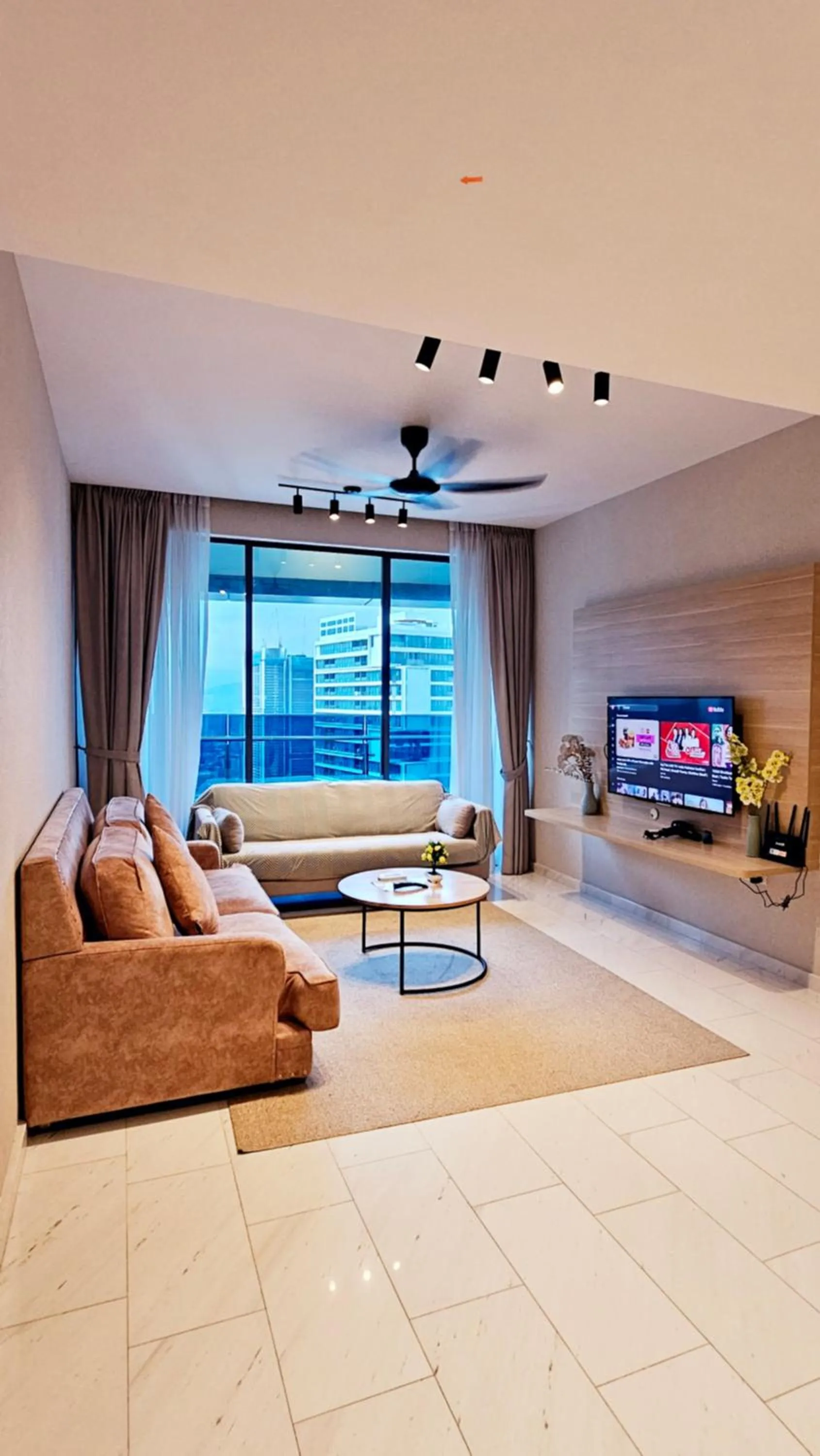Communal lounge/ TV room in Crystal Service Suite At Eaton KLCC