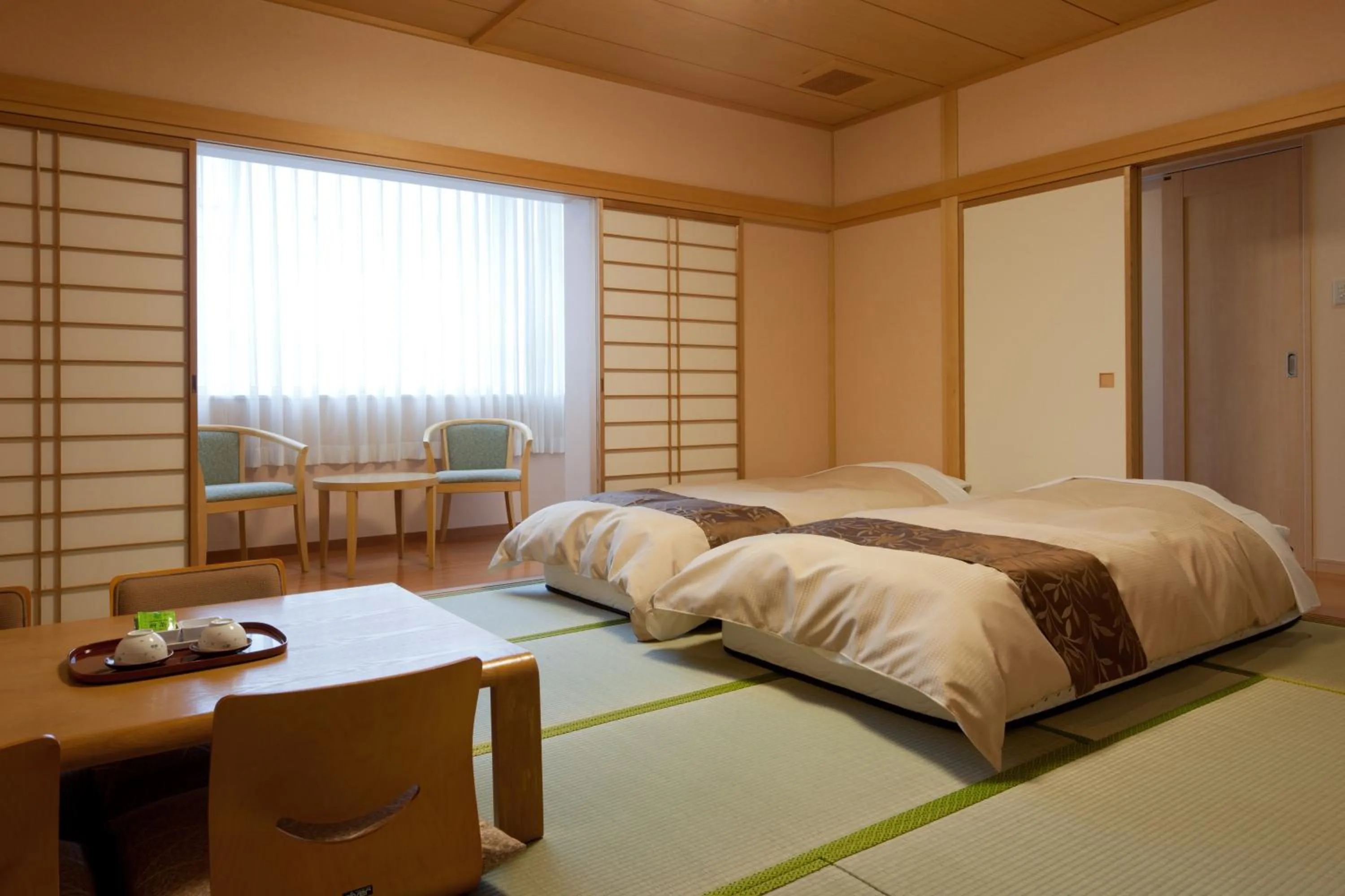 Photo of the whole room, Bed in Hotel Morinokaze Tateyama‎