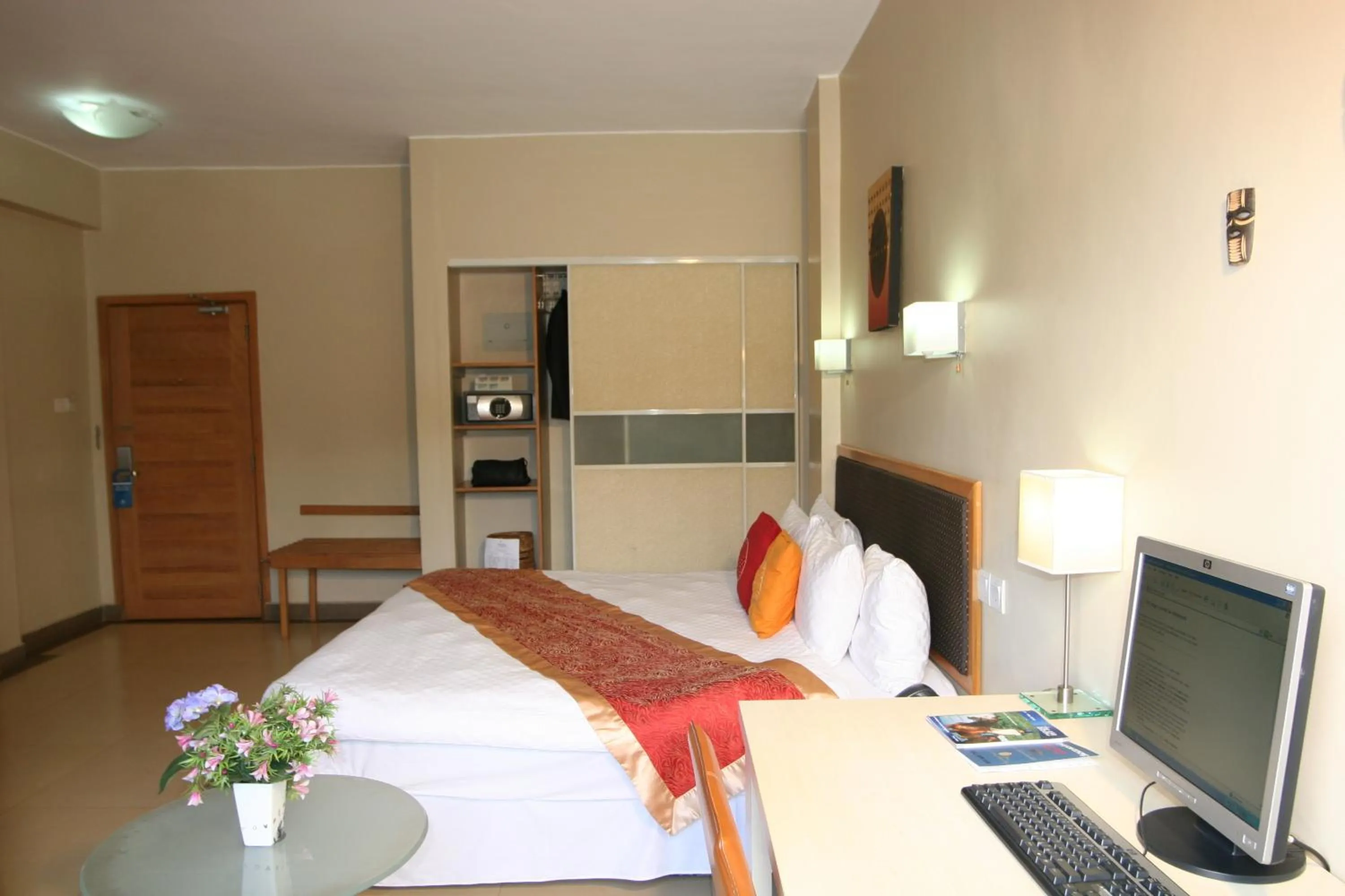 Photo of the whole room, Bed in Metropole Hotel Kampala