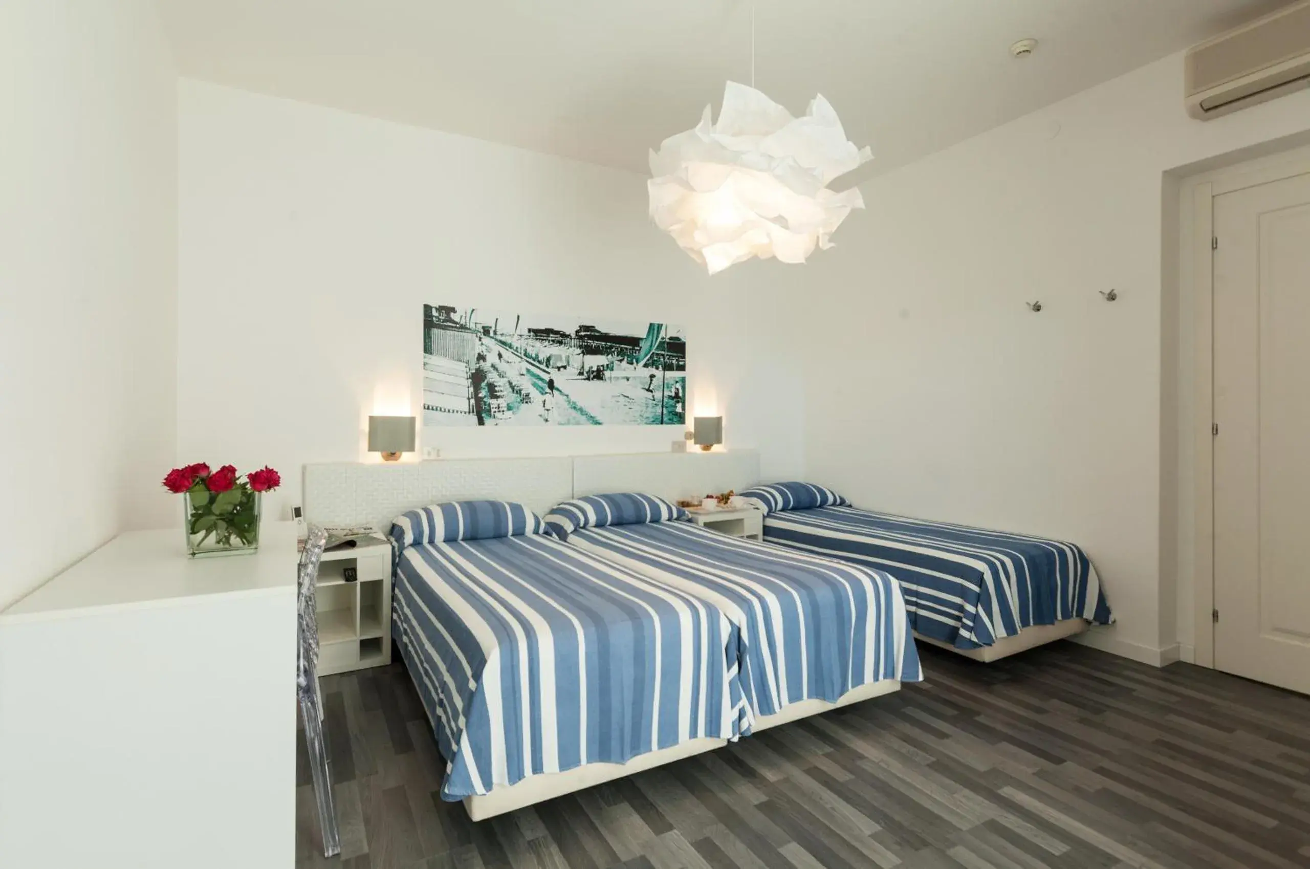 Triple Room with Garden View in Albergo alla Spiaggia Triple Room with Garden View in Albergo alla Spiaggia