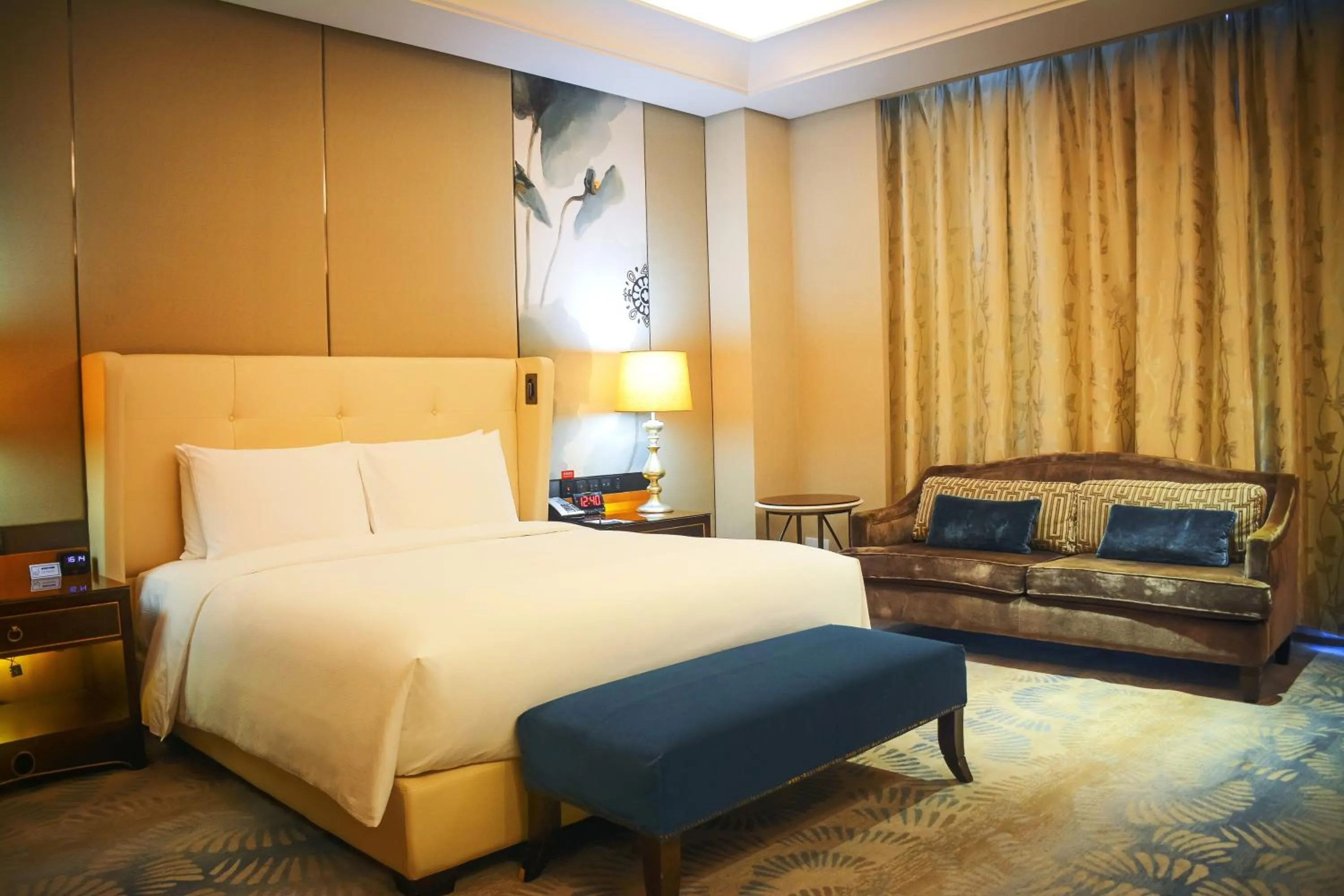 Seating area, Bed in Hilton Urumqi