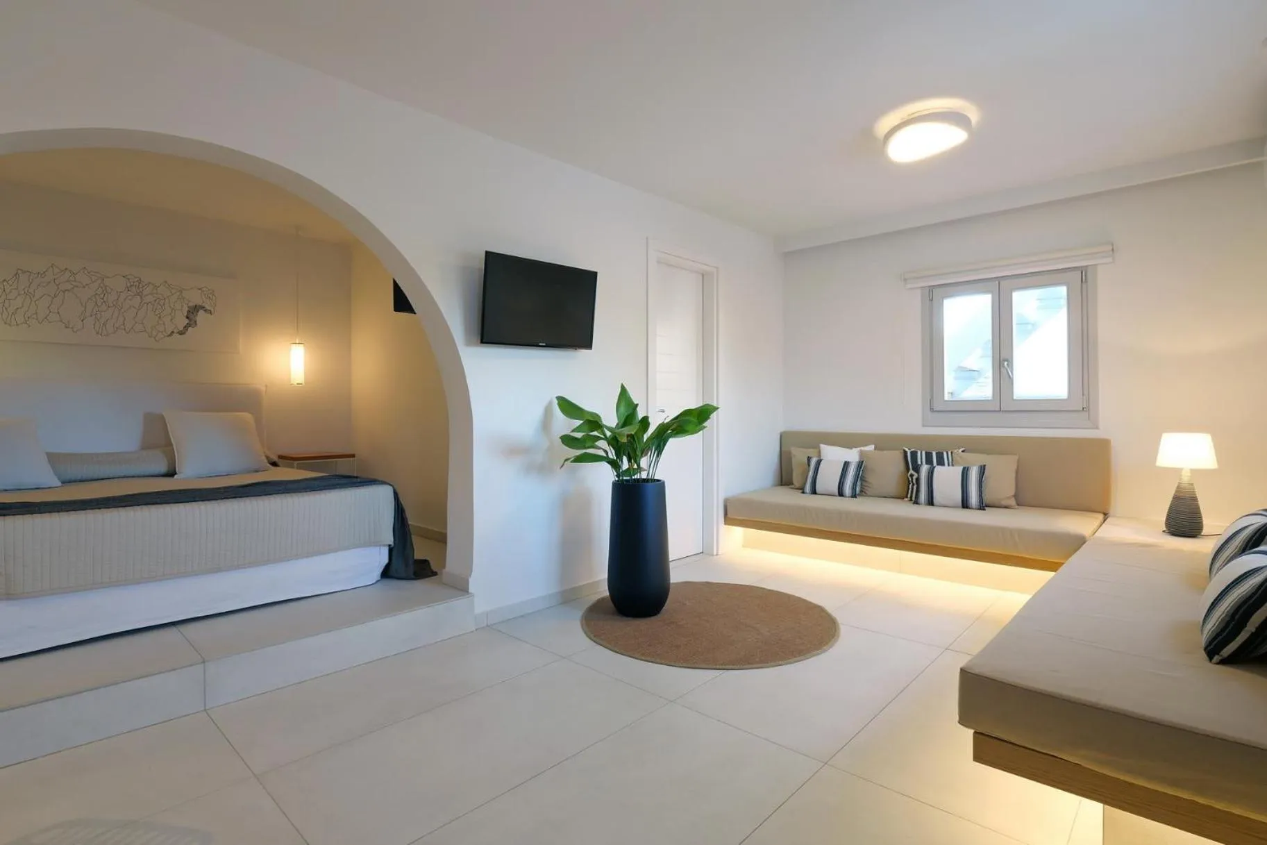 Bed in Andronikos Hotel