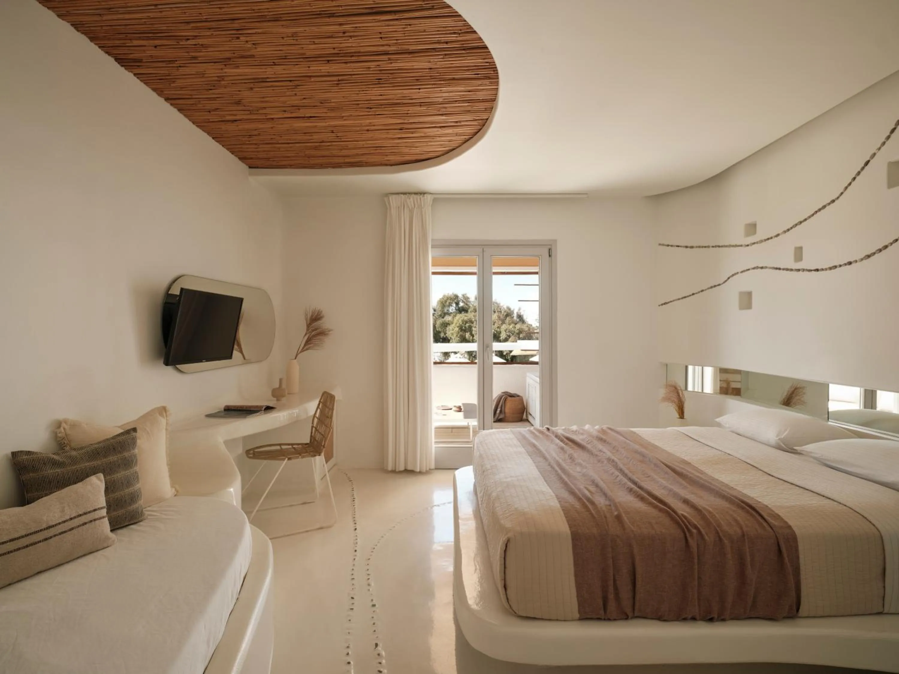 Bed in Andronikos Hotel