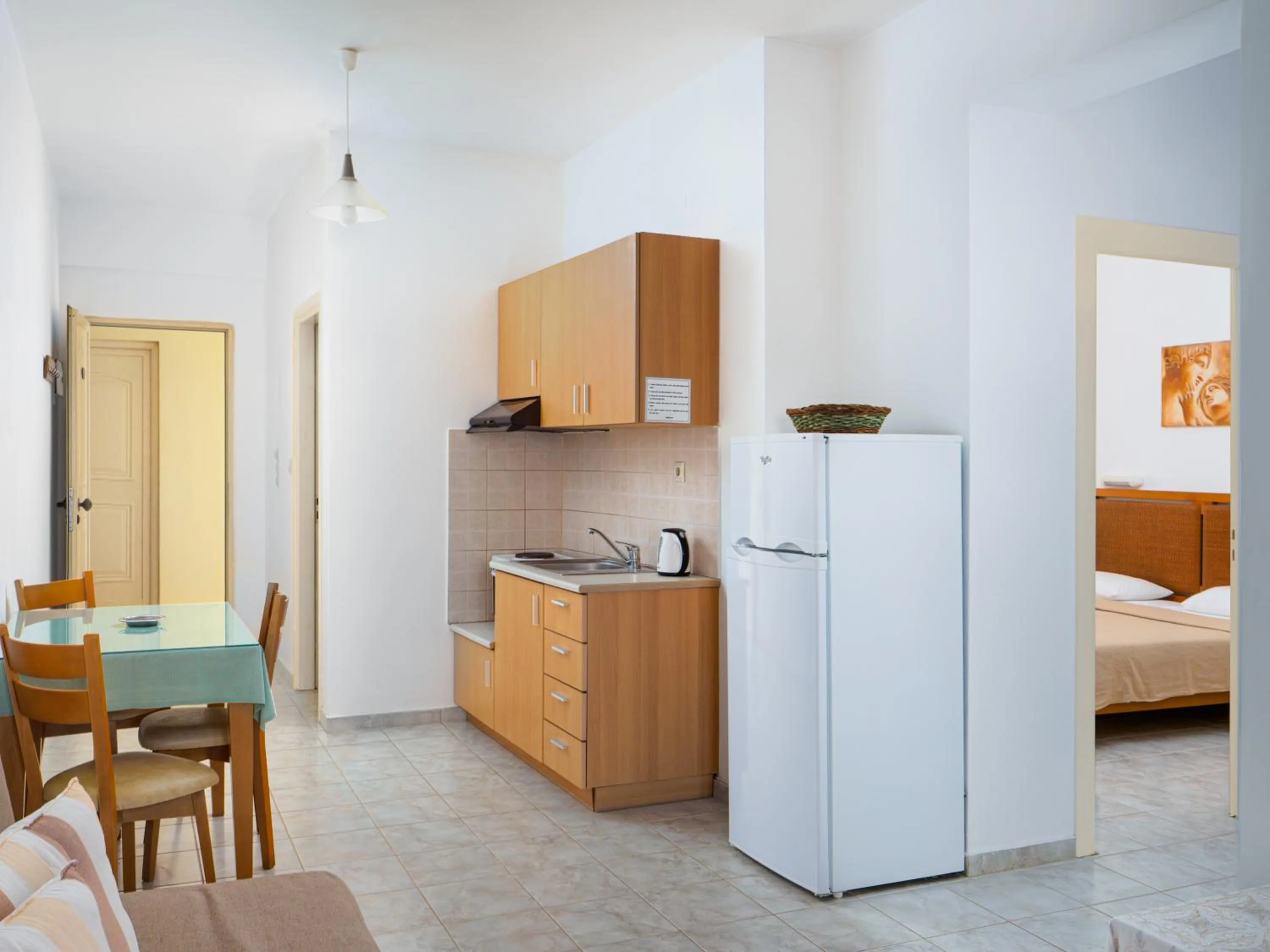 Kitchen or kitchenette, Bed in Fotis Studios Apartments