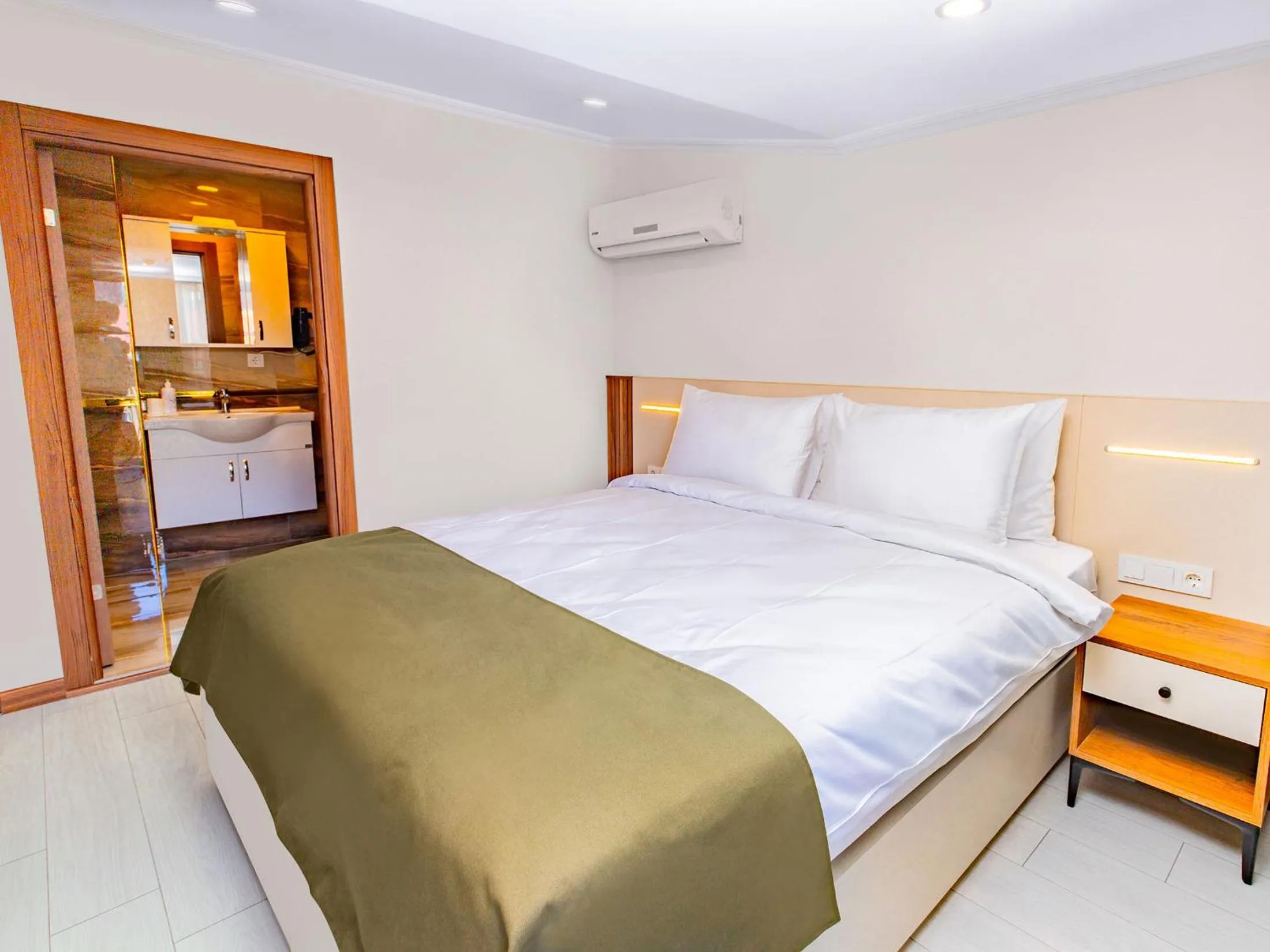 Bed in Quinnova Hotel