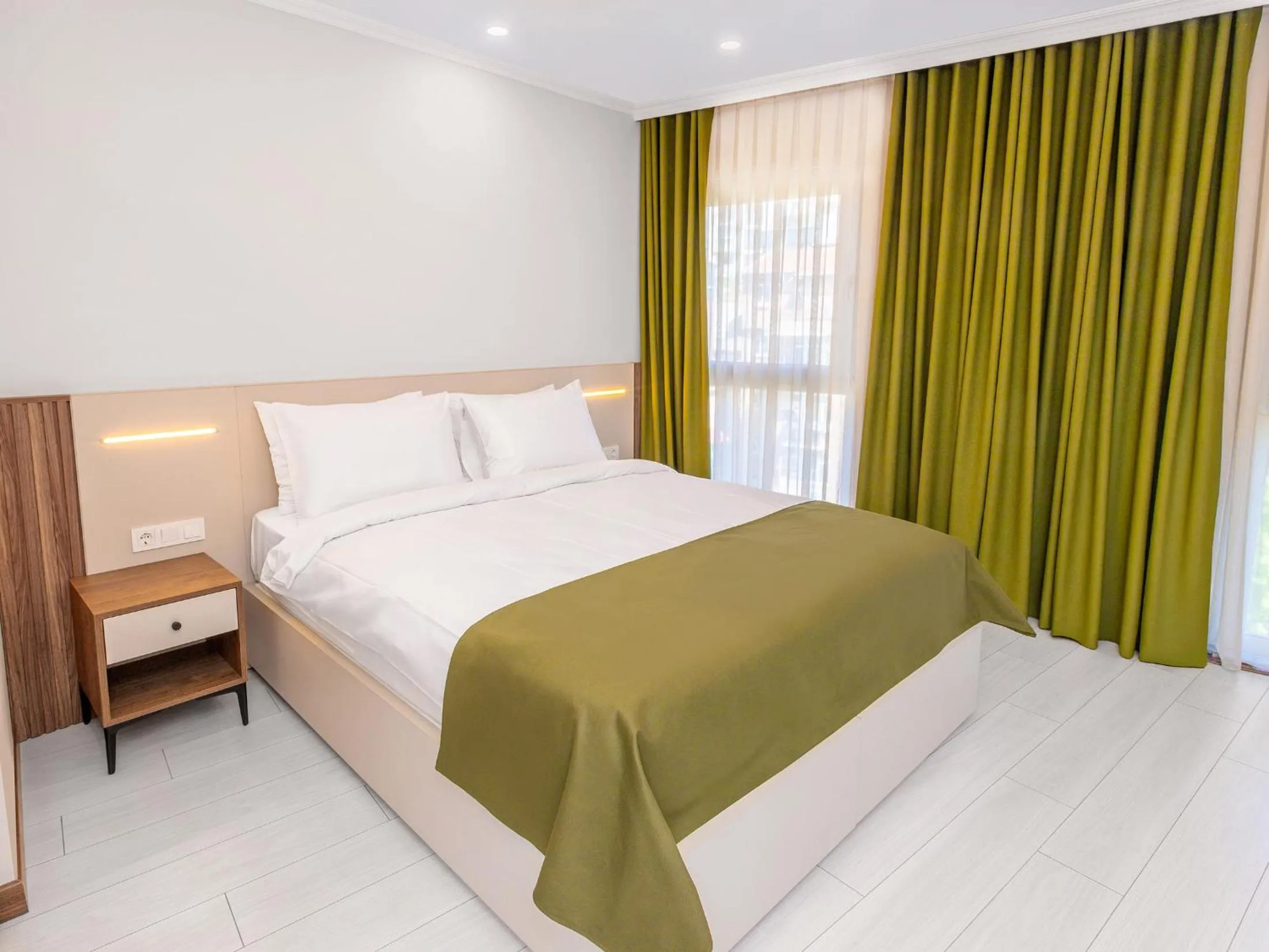 Bed in Quinnova Hotel