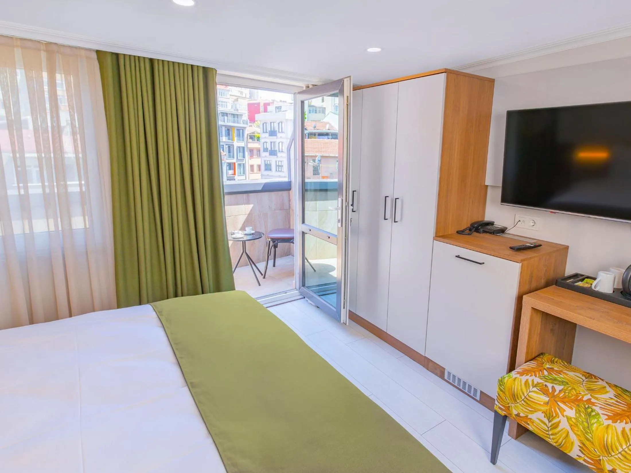 Bed in Quinnova Hotel