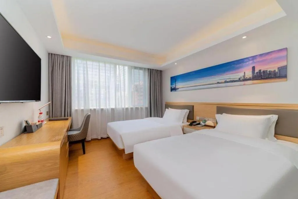 Bed in Guangzhou New Tianhe Hotel