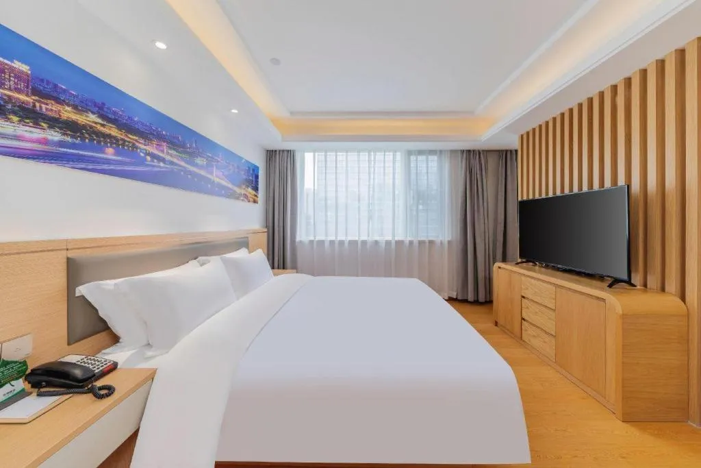 Bed in Guangzhou New Tianhe Hotel