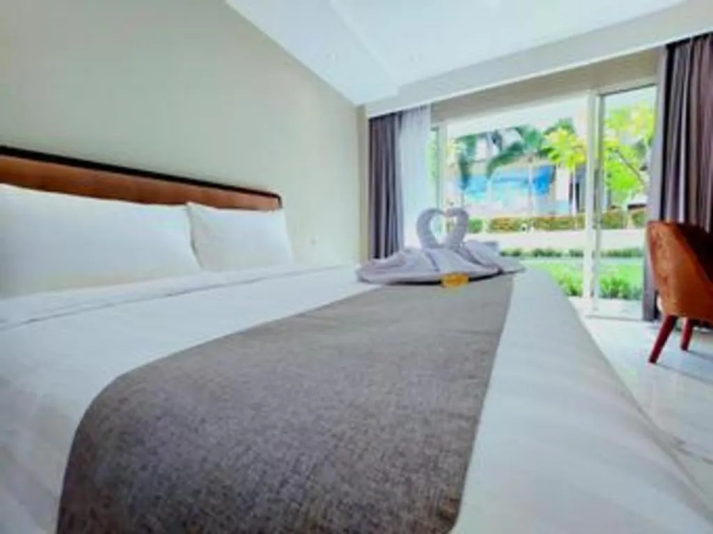 Bed in Rama Garden Hotel