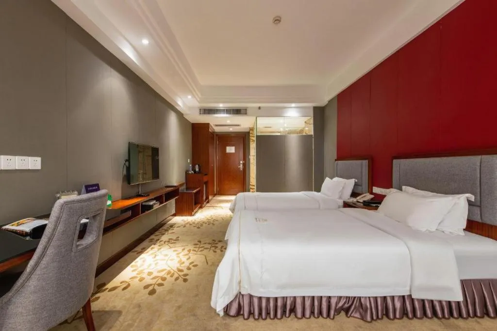 Bed in Shunde Emperor Hotel