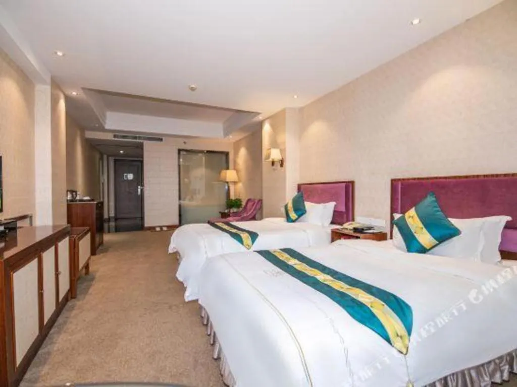 Bed in Shunde Emperor Hotel