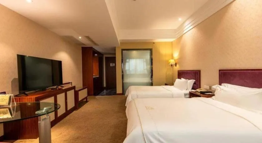 Bed in Shunde Emperor Hotel