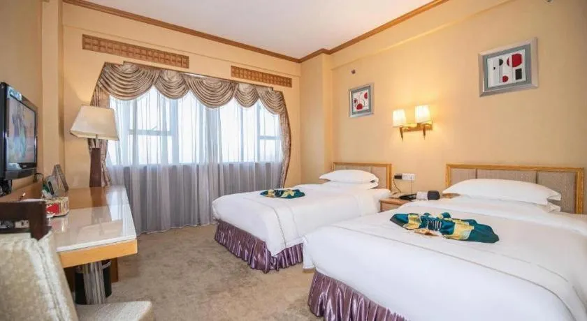 Bed in Shunde Emperor Hotel