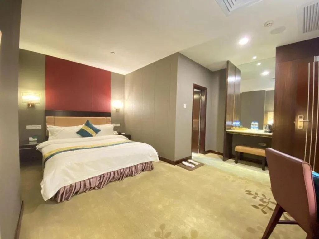 Bed in Shunde Emperor Hotel