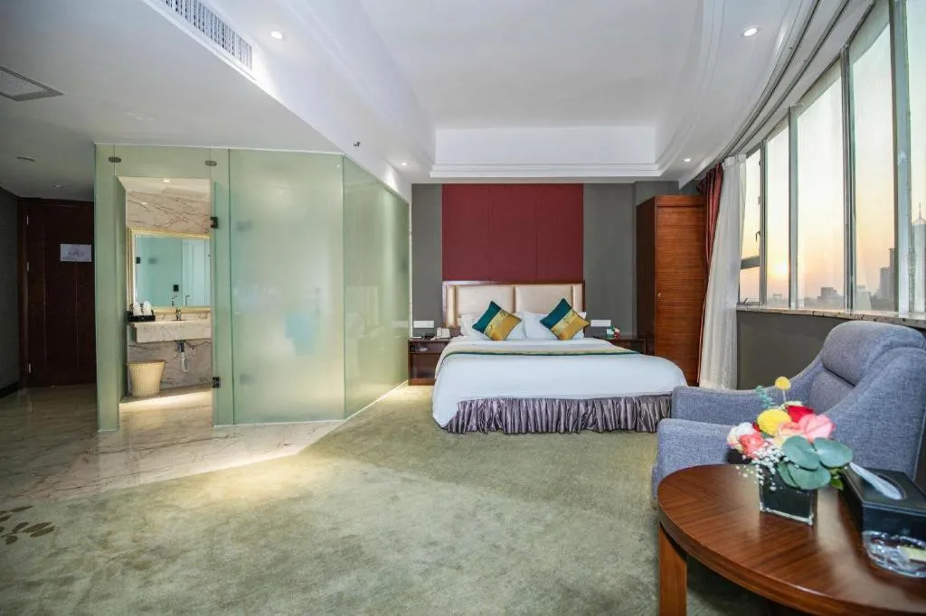 Bed in Shunde Emperor Hotel