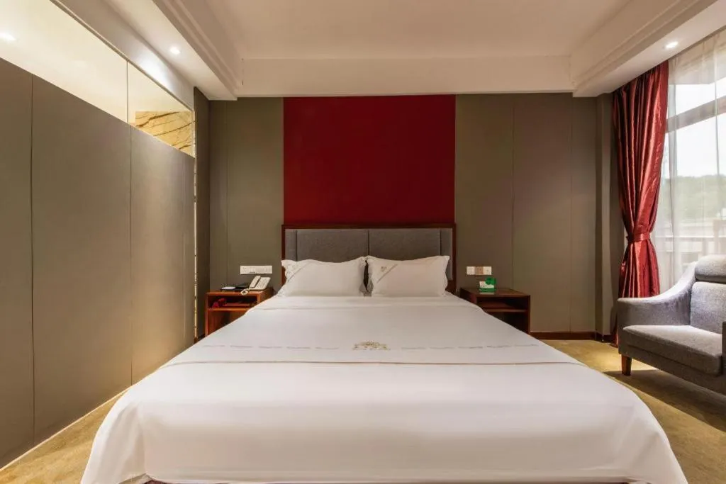 Bed in Shunde Emperor Hotel