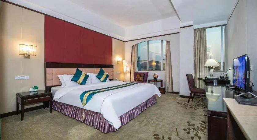 Bed in Shunde Emperor Hotel