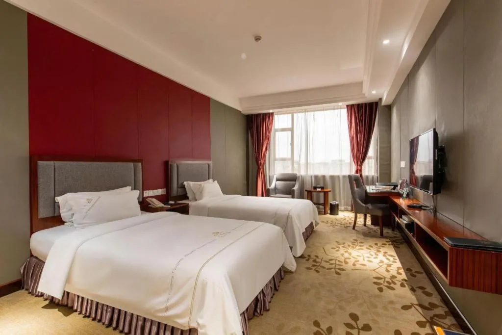 Bed in Shunde Emperor Hotel