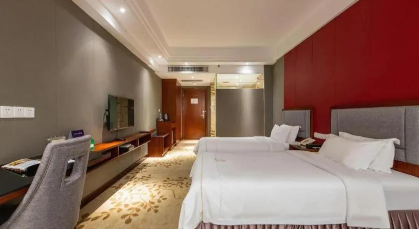 Bed in Shunde Emperor Hotel