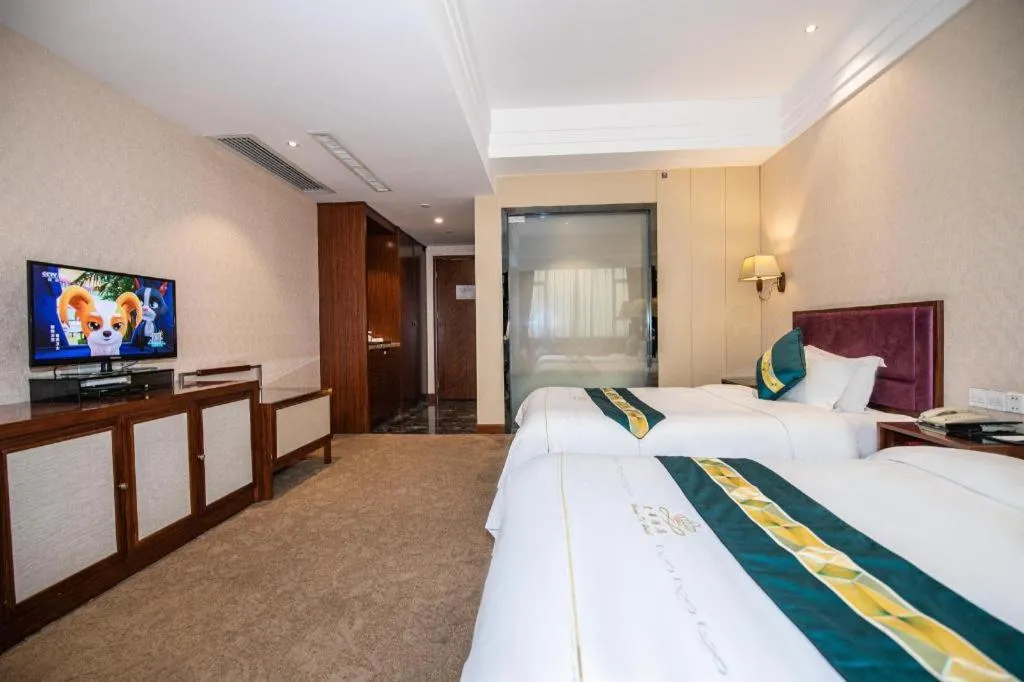 Bed in Shunde Emperor Hotel