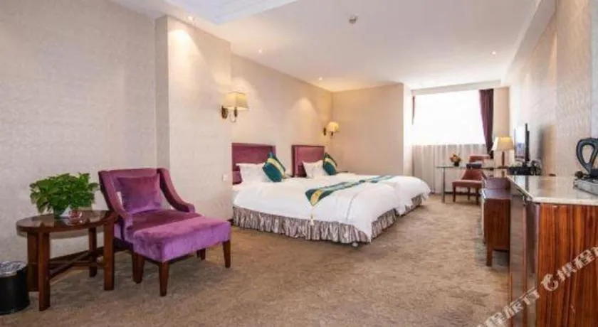 Bed in Shunde Emperor Hotel