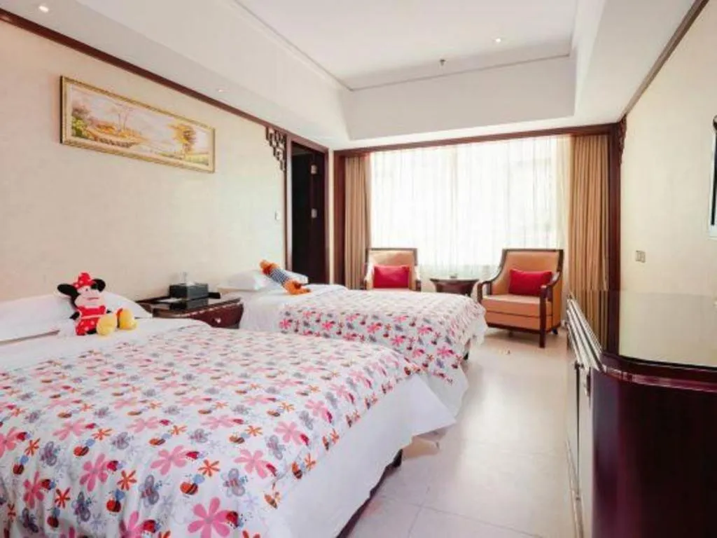 Bed in Haikou Conifer Garden Hotel