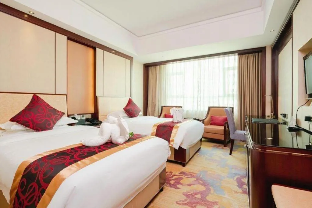 Bed in Haikou Conifer Garden Hotel