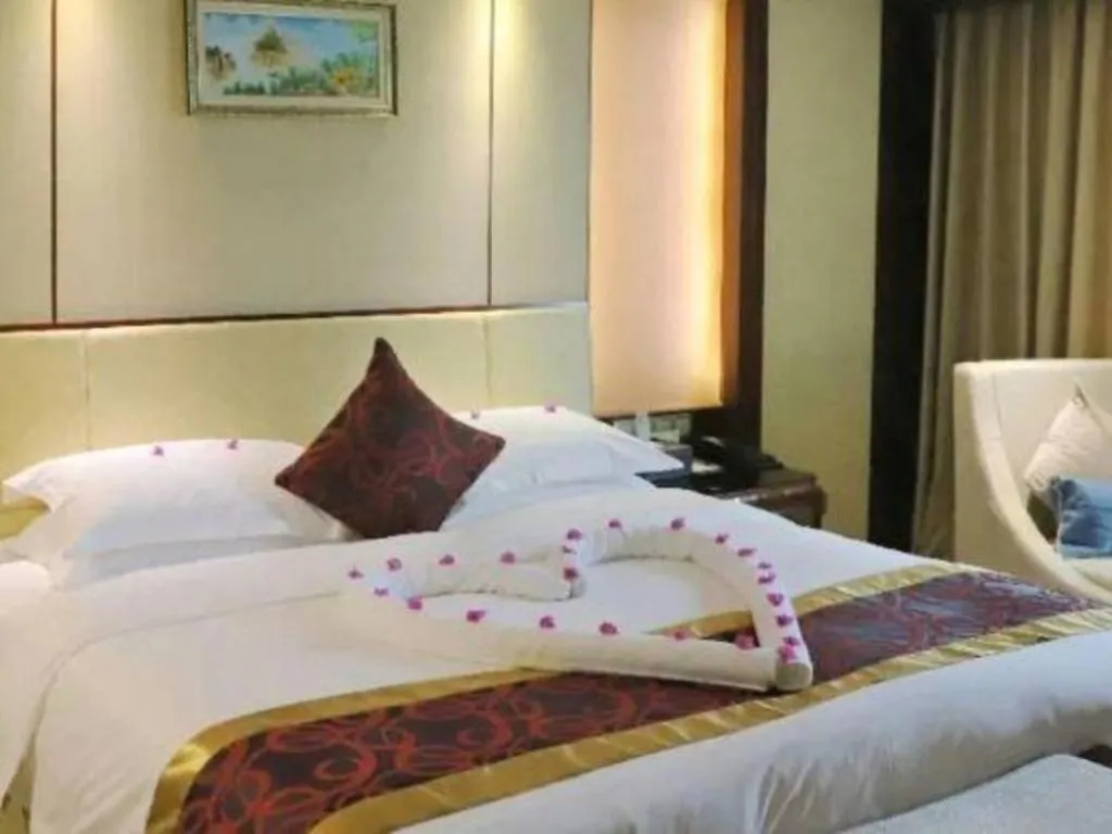 Bed in Haikou Conifer Garden Hotel