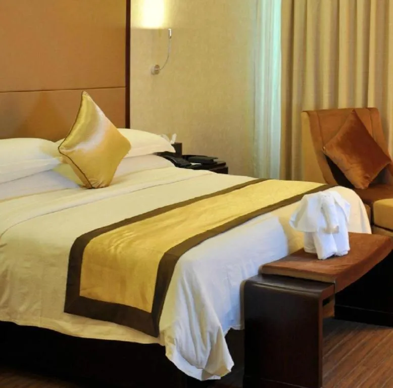 Bed in Haikou Conifer Garden Hotel