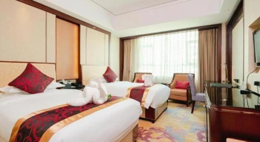 Bed in Haikou Conifer Garden Hotel