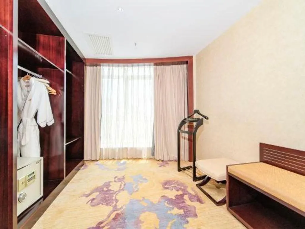 Bed in Haikou Conifer Garden Hotel