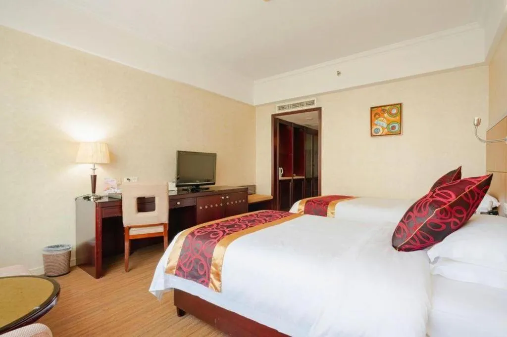 Bed in Haikou Conifer Garden Hotel