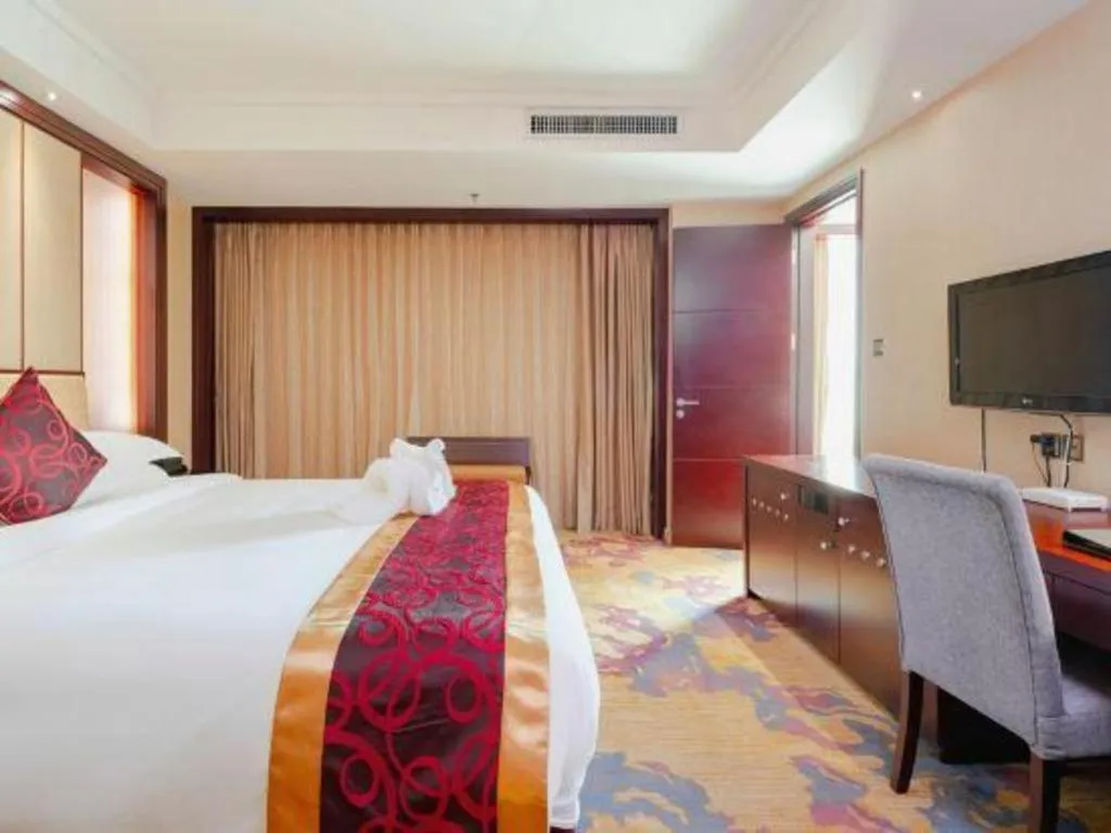 Bed in Haikou Conifer Garden Hotel