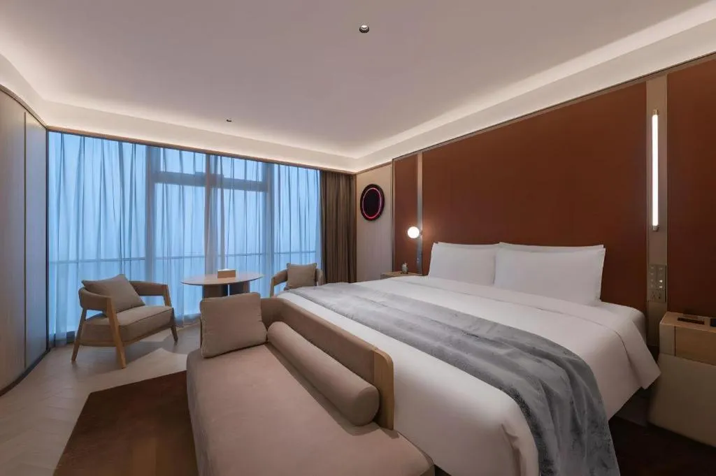 Bed in Lijia Hotel