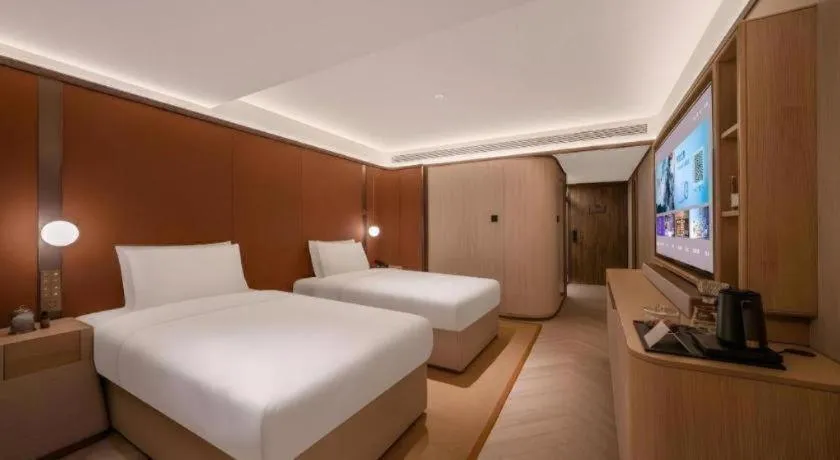 Bed in Lijia Hotel