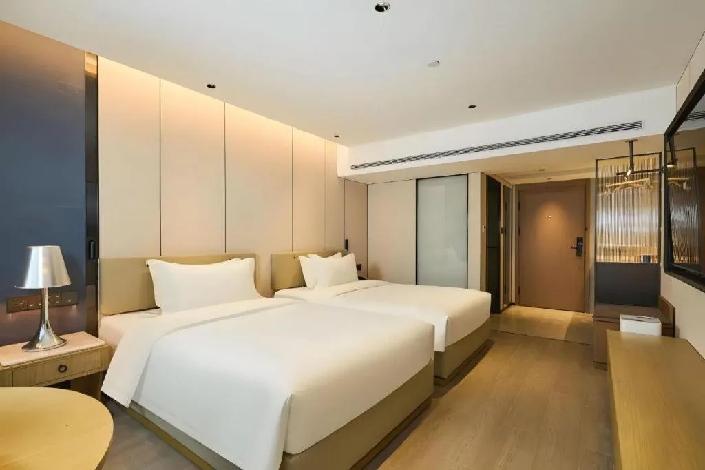 Bed in Lijia Hotel