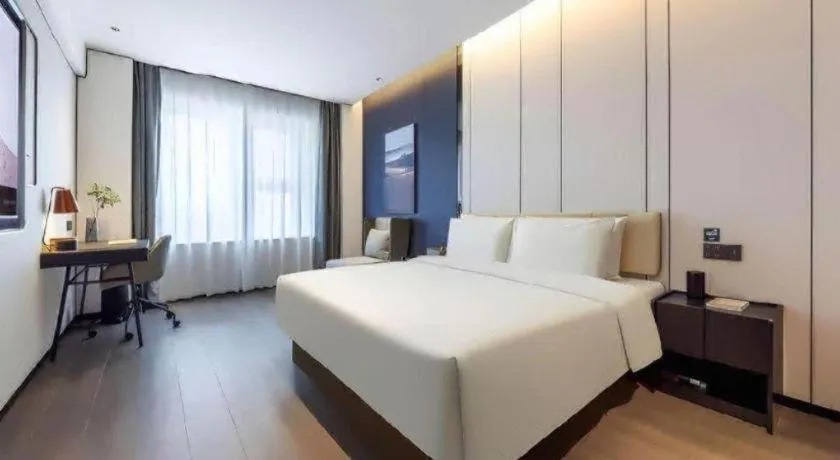 Bed in Lijia Hotel