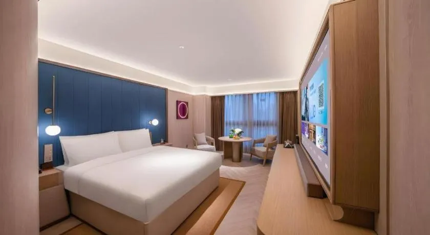 Bed in Lijia Hotel