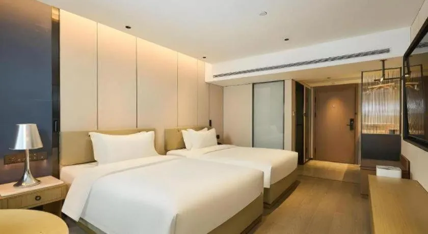 Bed in Lijia Hotel