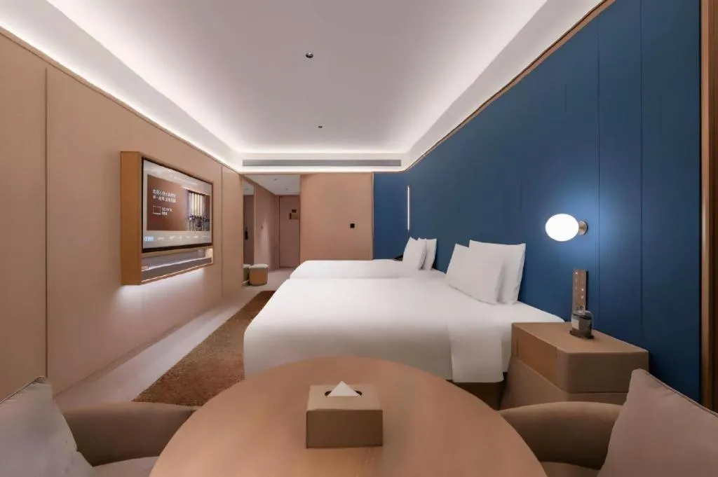 Bed in Lijia Hotel