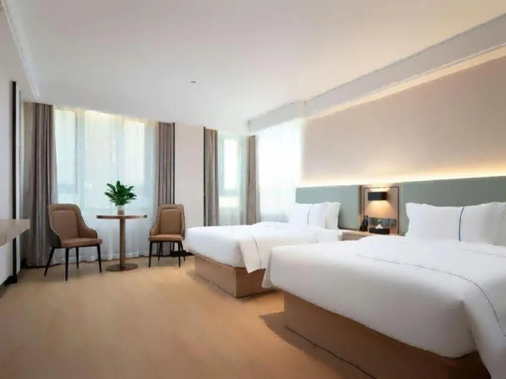 Bed in Lijia Hotel