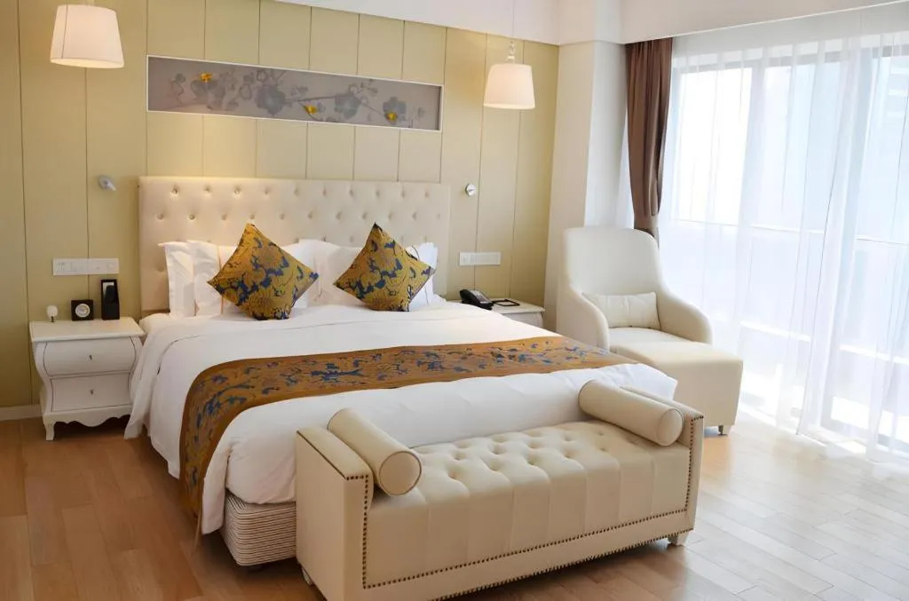 Bed in Wyndham Garden Hotel