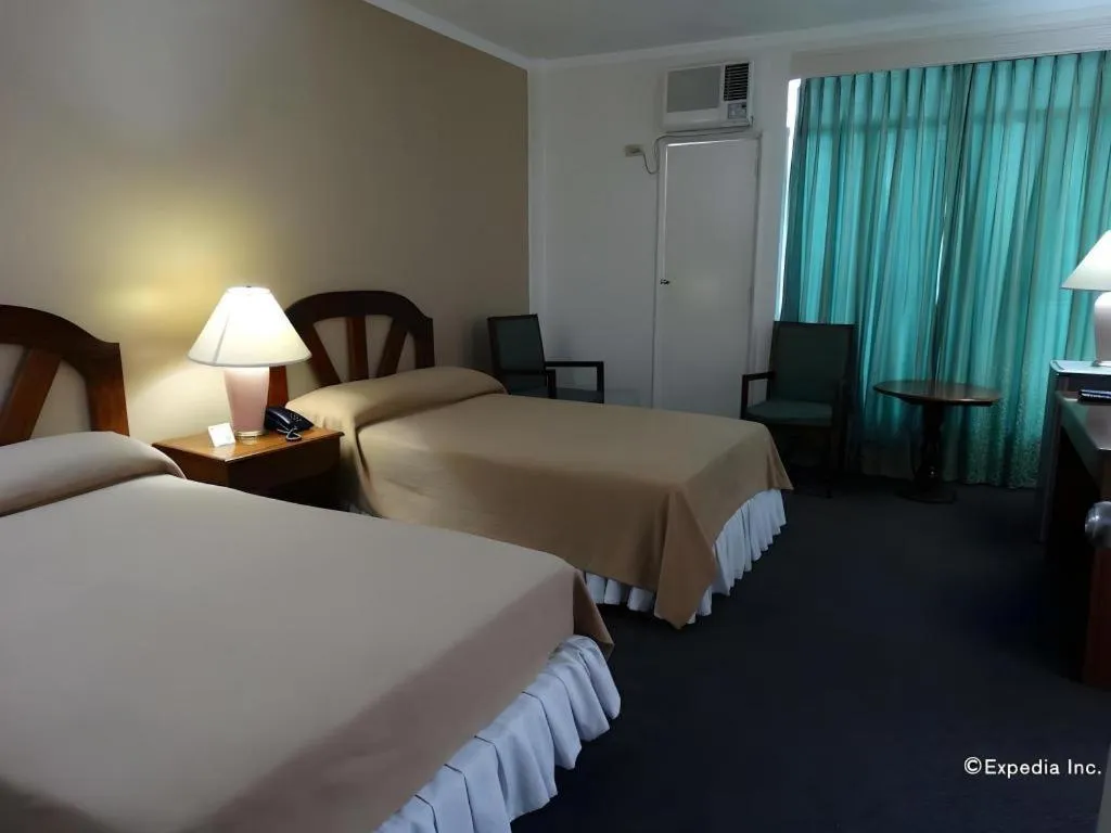 Bed in Adriatico Arms Hotel